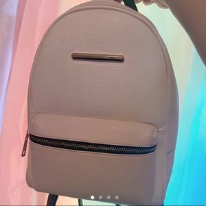 Light pink and cream backpack with gold details